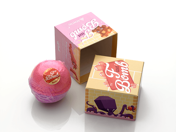 Promotional packaging box for Sentry containing a colorful bath bomb